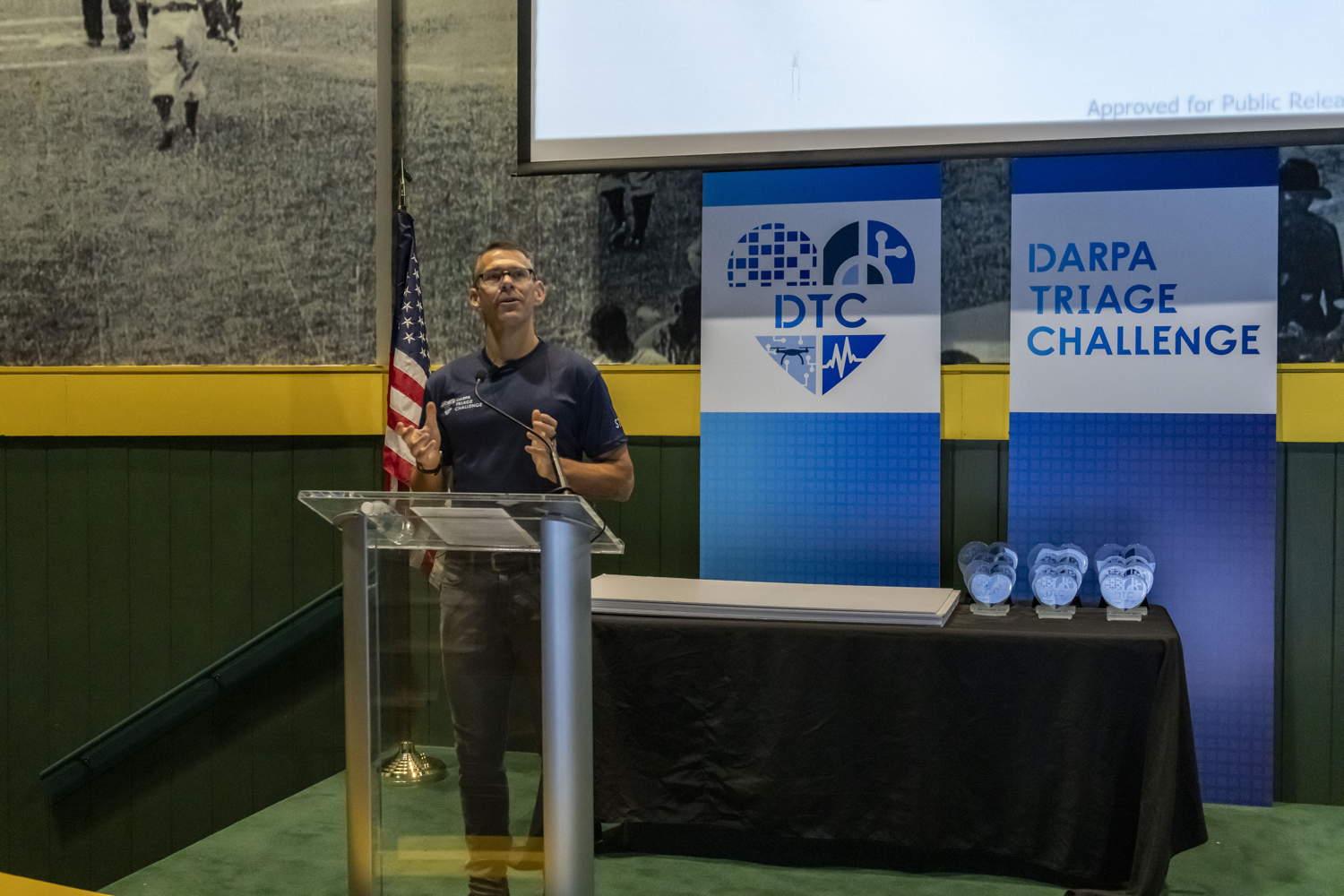 DARPA Program Manager presenting awards