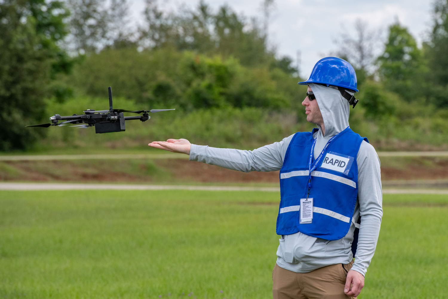 Team RAPID member hand launches UAV