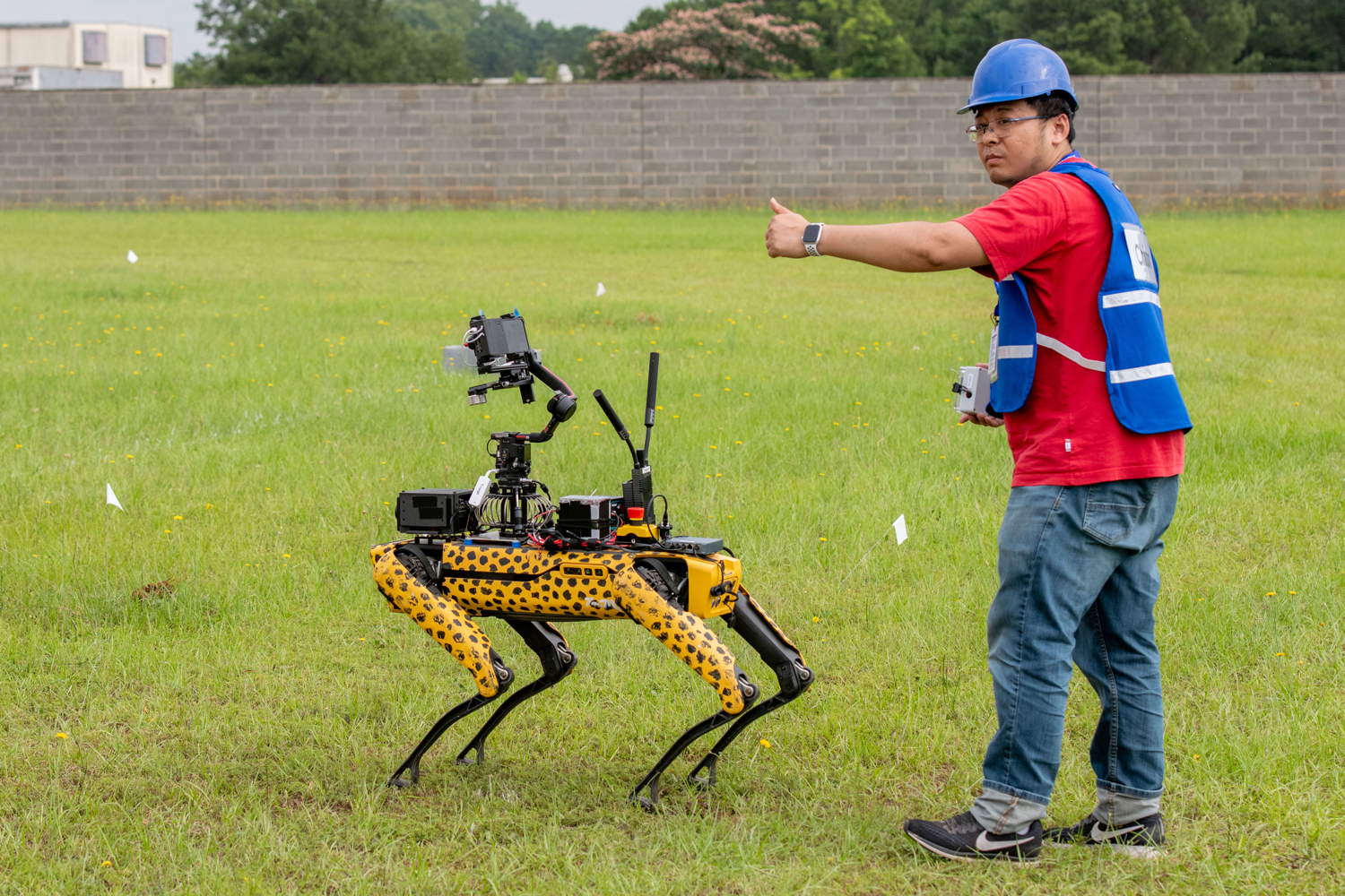 Team member introduces UGV to course